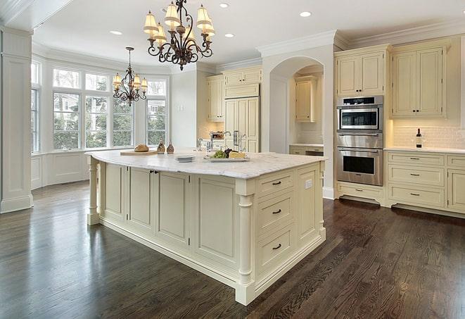 newly installed grey laminate flooring in modern kitchen in Lakewood